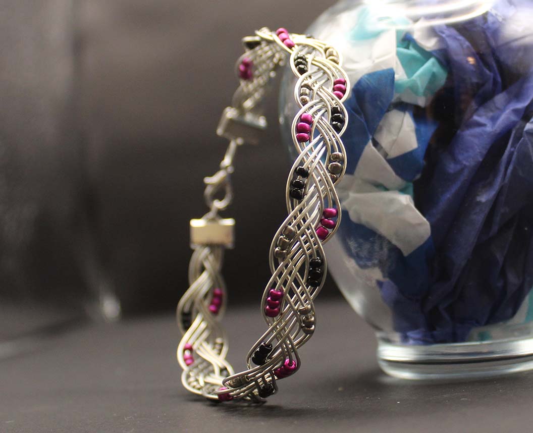 Ravens theme woven bracelet